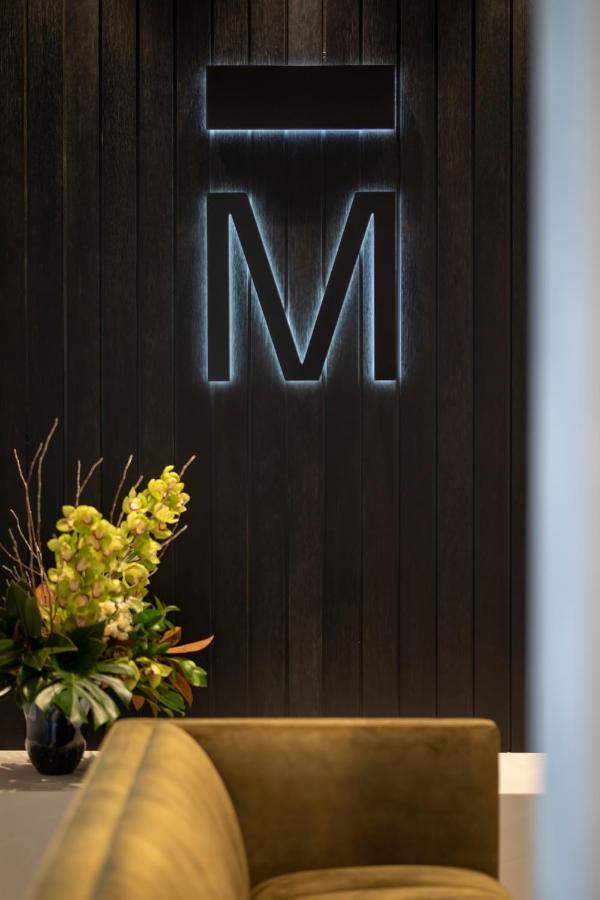 The Mayfair Christchurch Extérieur photo The M on the wall of the lobby